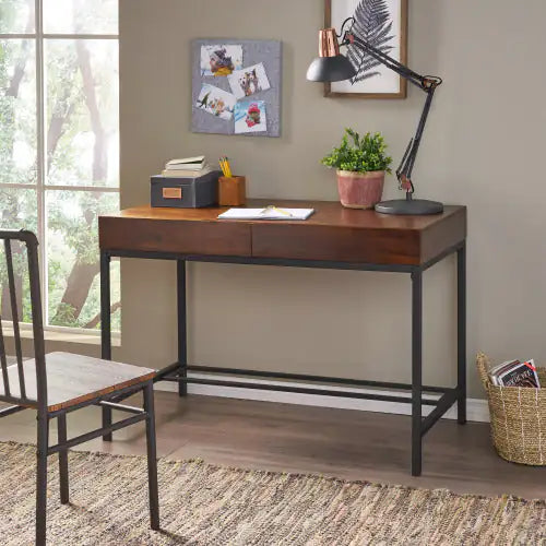 Oblivis Modern Sleek Desk with oak wood top, black metal legs, and central storage drawer in a home office setting